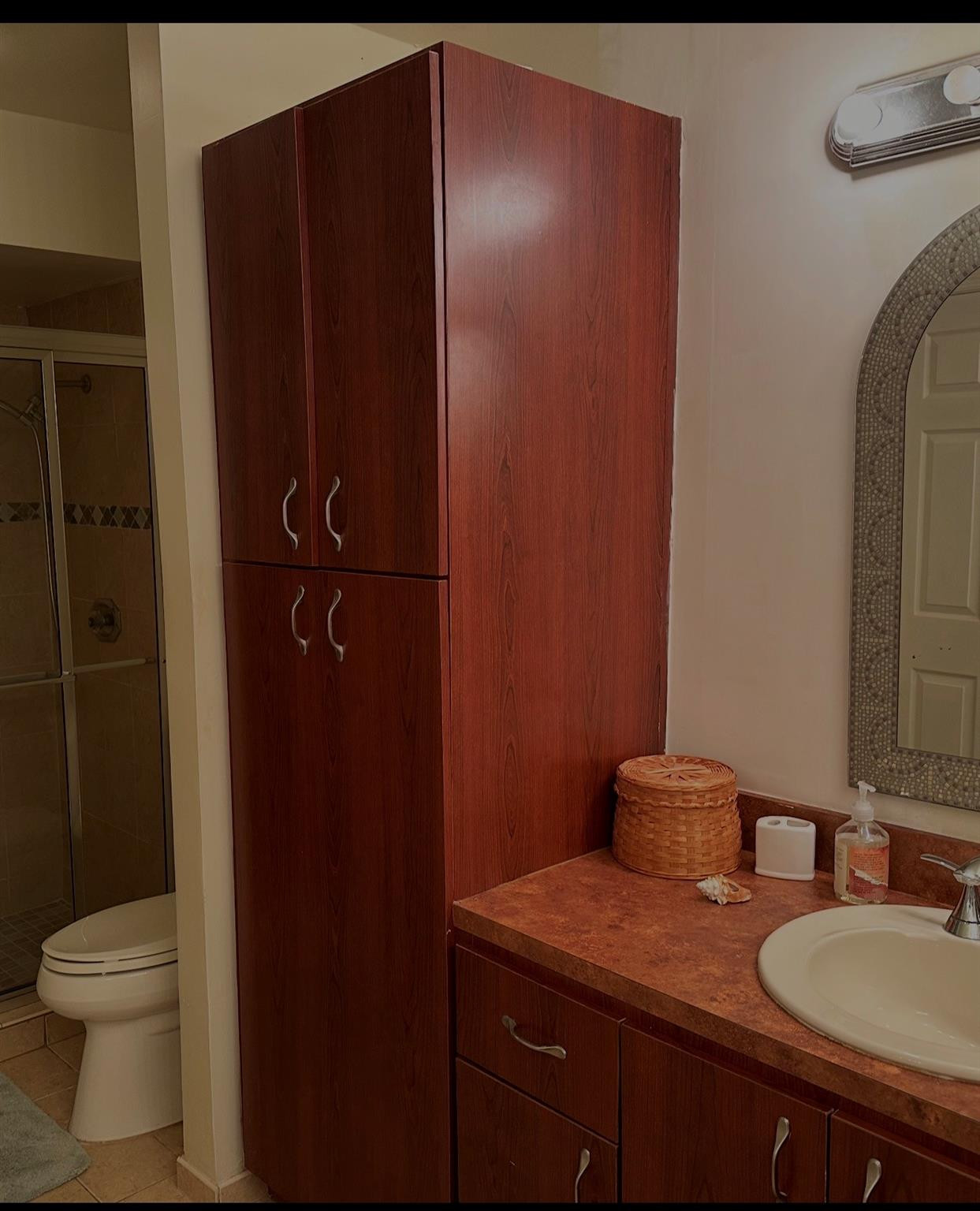 2925 Azalea Drive Hollywood, FL 33026 - Photo 5 of 13 a bathroom with a granite countertop sink toilet and shower