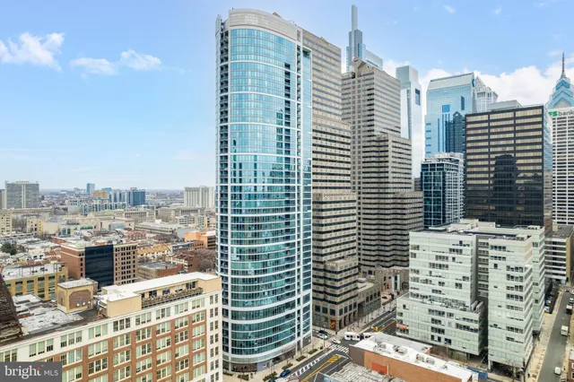 a view of a city with tall buildings