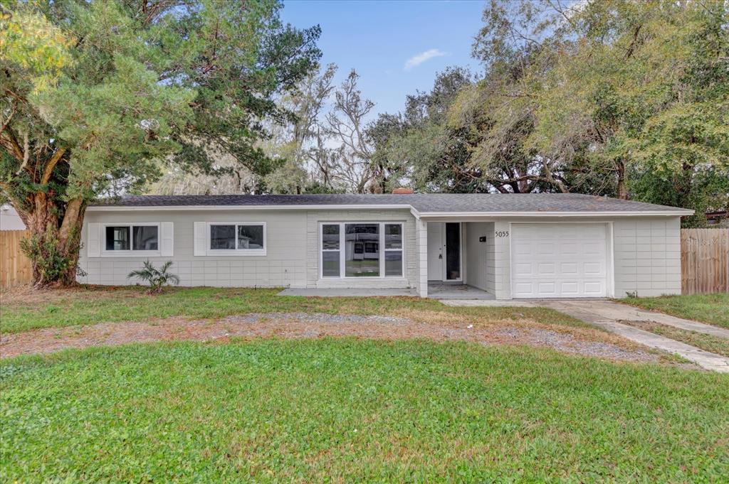 5055 Lake Howell Road Winter Park, FL 32792 - Photo 1 of 1 front view of a house and a yard