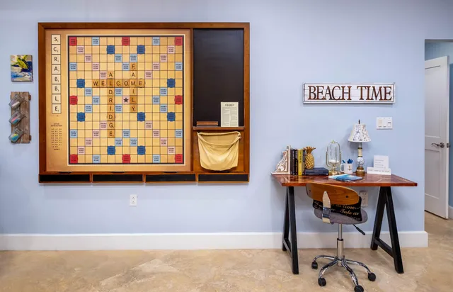 a bedroom with a large bed and a flat screen tv