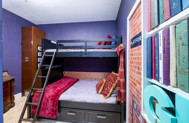 a view of a livingroom with furniture wooden floor and window