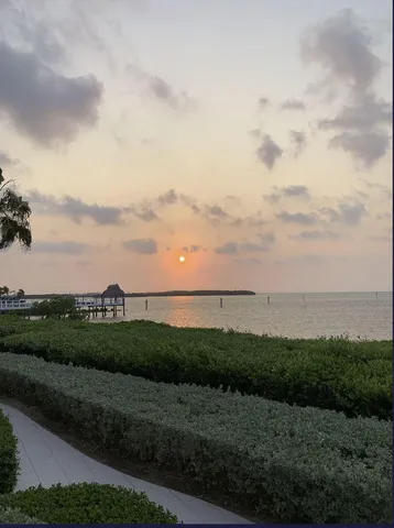 a view of swimming pool with outdoor seating