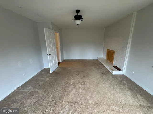 a bathroom with a double vanity sink toilet and shower