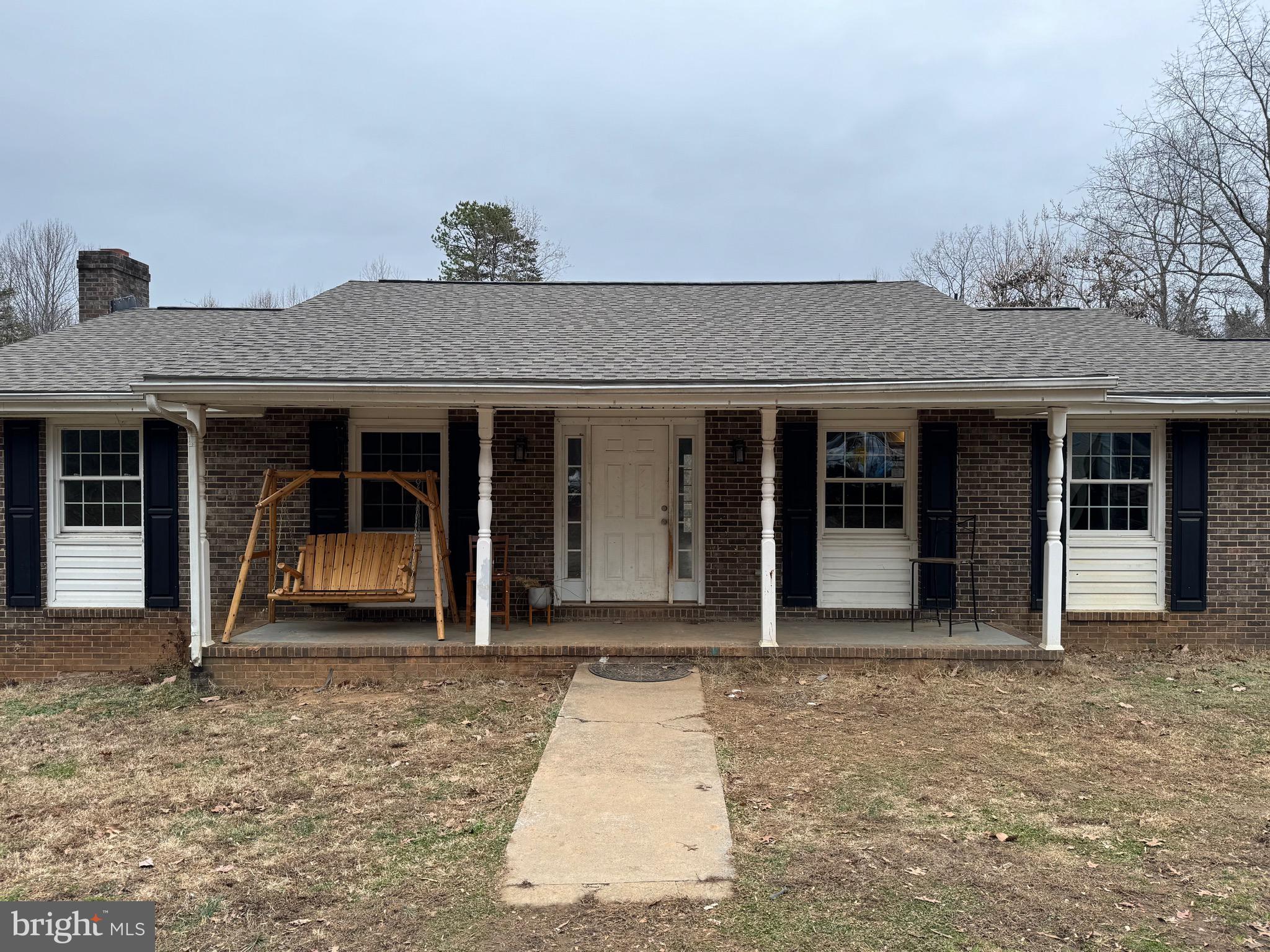 307 Dan Hall Road Mineral, VA 23117 - Photo 2 of 36 a front view of a house with a yard