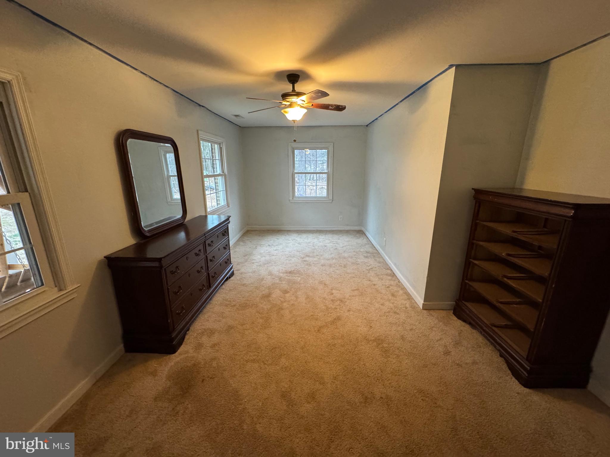 307 Dan Hall Road Mineral, VA 23117 - Photo 23 of 36 a view of a livingroom with wooden floor and stairs