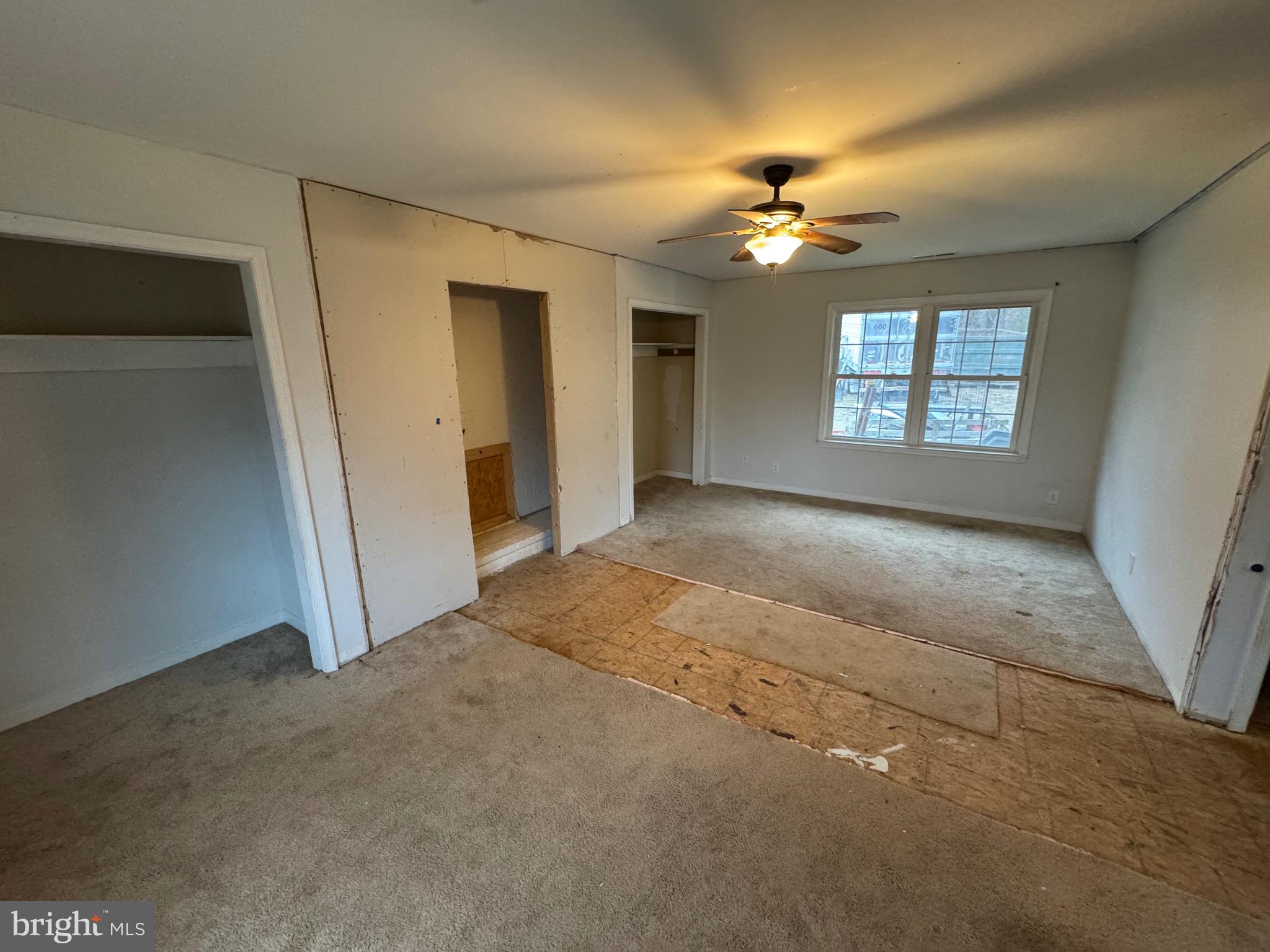307 Dan Hall Road Mineral, VA 23117 - Photo 25 of 36 a view of a livingroom with a ceiling fan and window