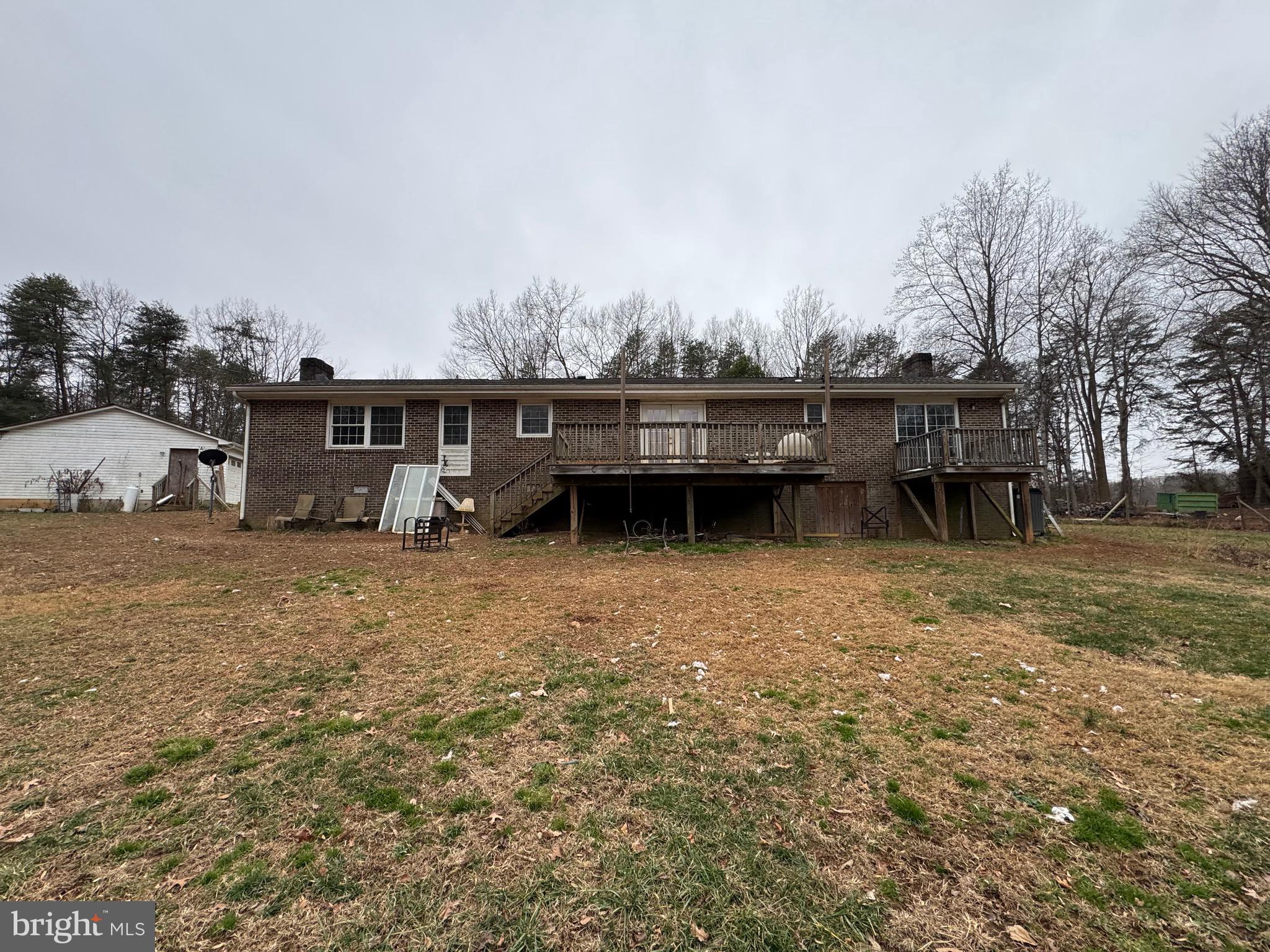 307 Dan Hall Road Mineral, VA 23117 - Photo 27 of 36 a view of a house with a yard and sitting area