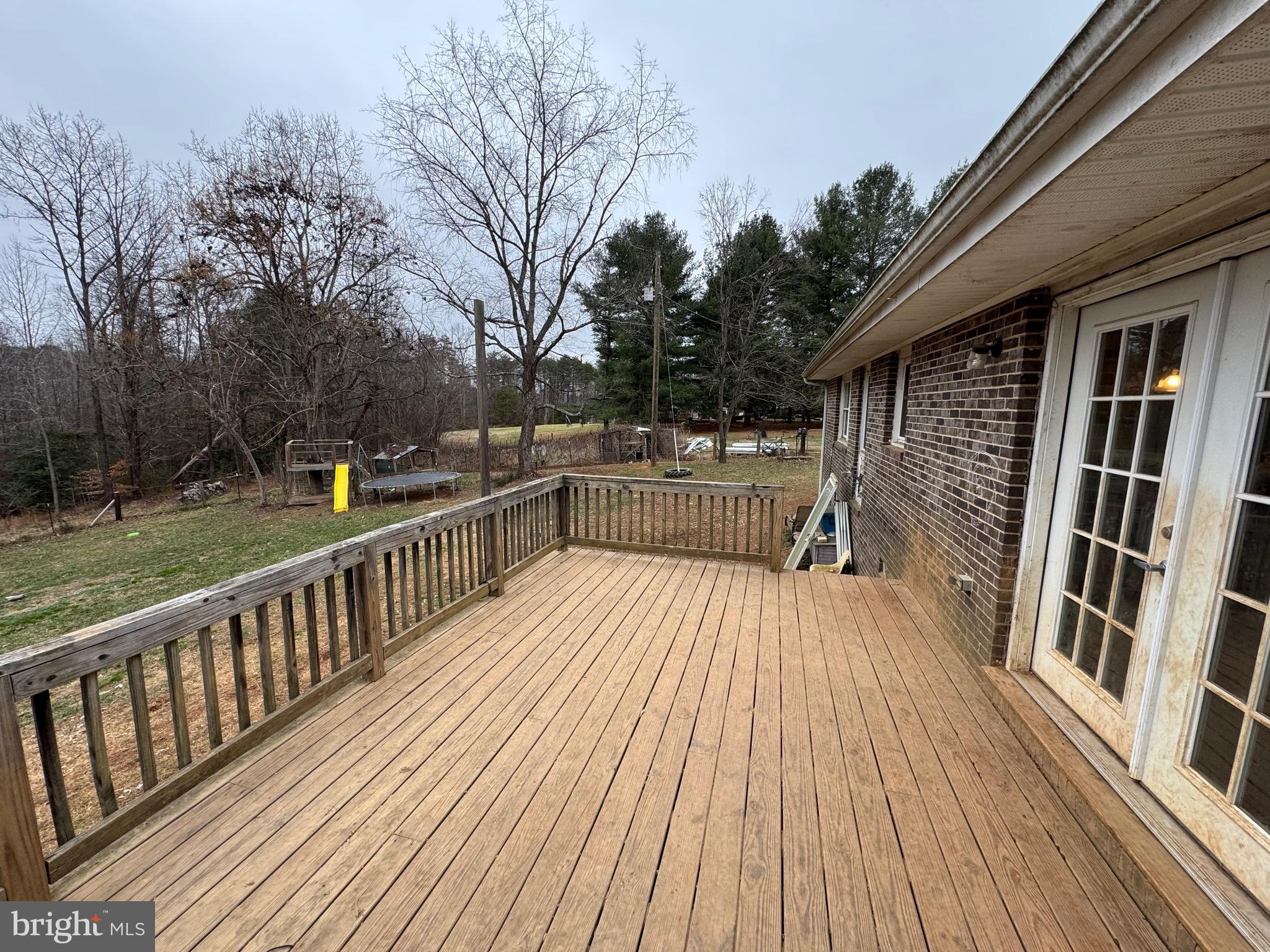 307 Dan Hall Road Mineral, VA 23117 - Photo 30 of 36 a view of backyard with deck and wooden floor