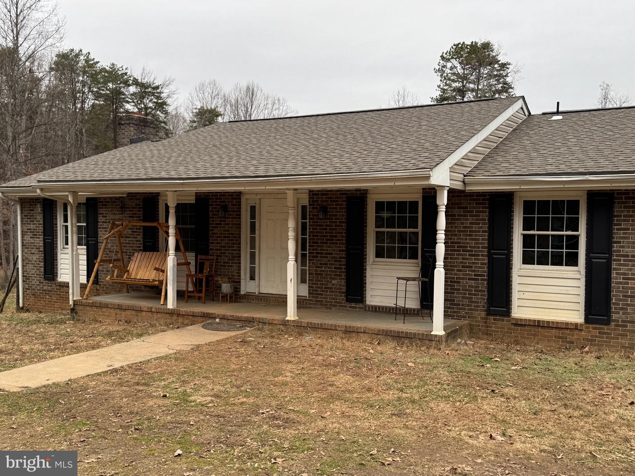 307 Dan Hall Road Mineral, VA 23117 - Photo 3 of 36 a front view of a house with glass windows