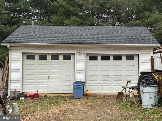 front view of a house with a sitting area
