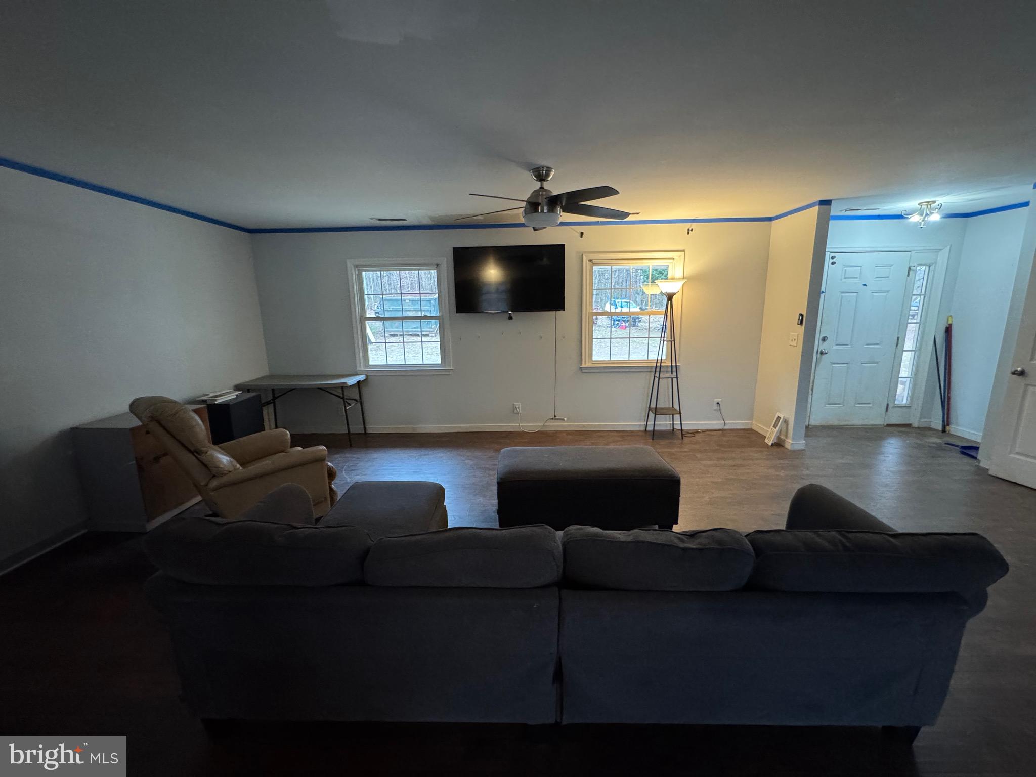 307 Dan Hall Road Mineral, VA 23117 - Photo 8 of 36 a living room with furniture and a flat screen tv