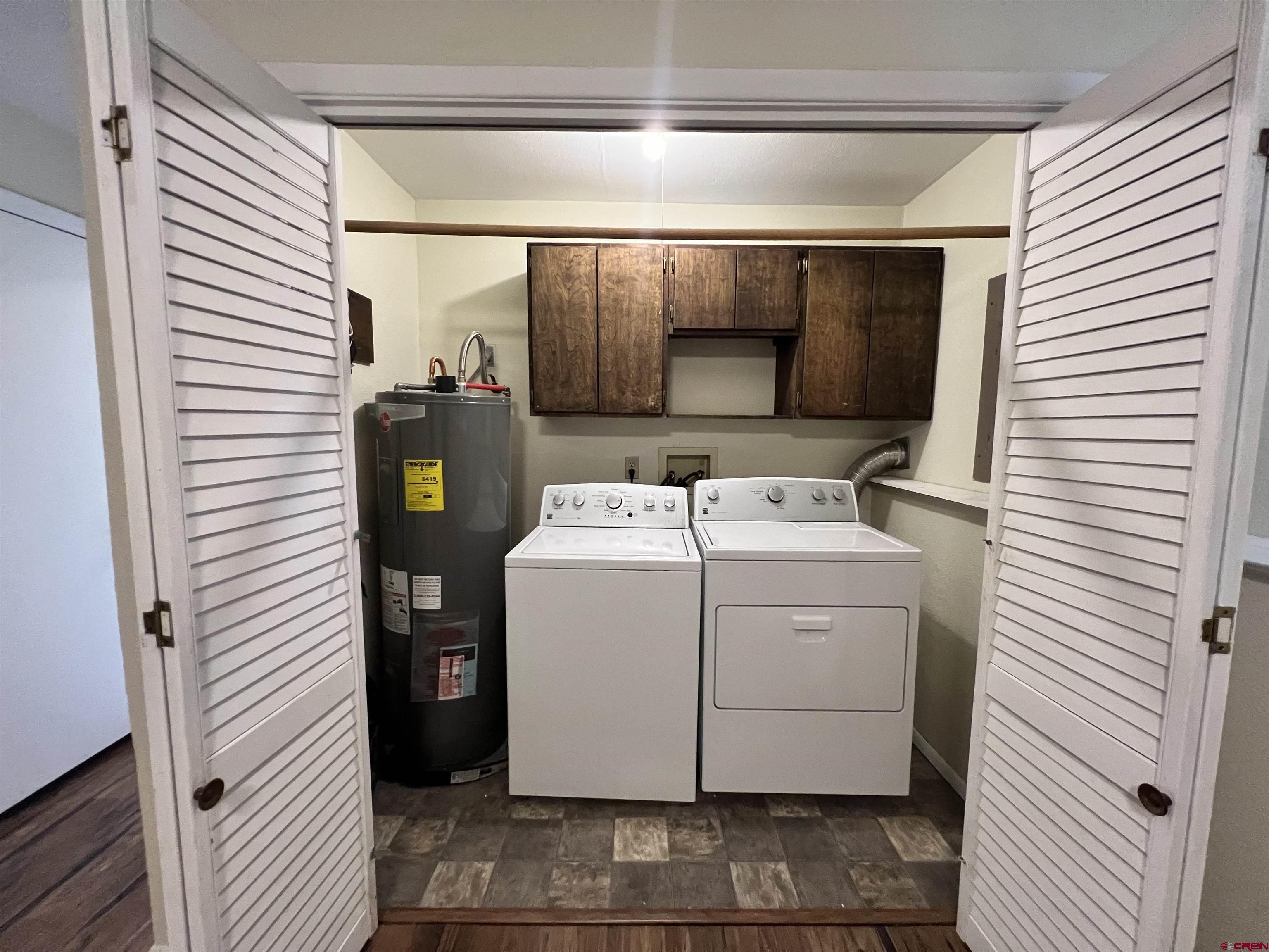 1328 Jackson Street Cortez, CO 81321 - Photo 24 of 37 a utility room with dryer and washer