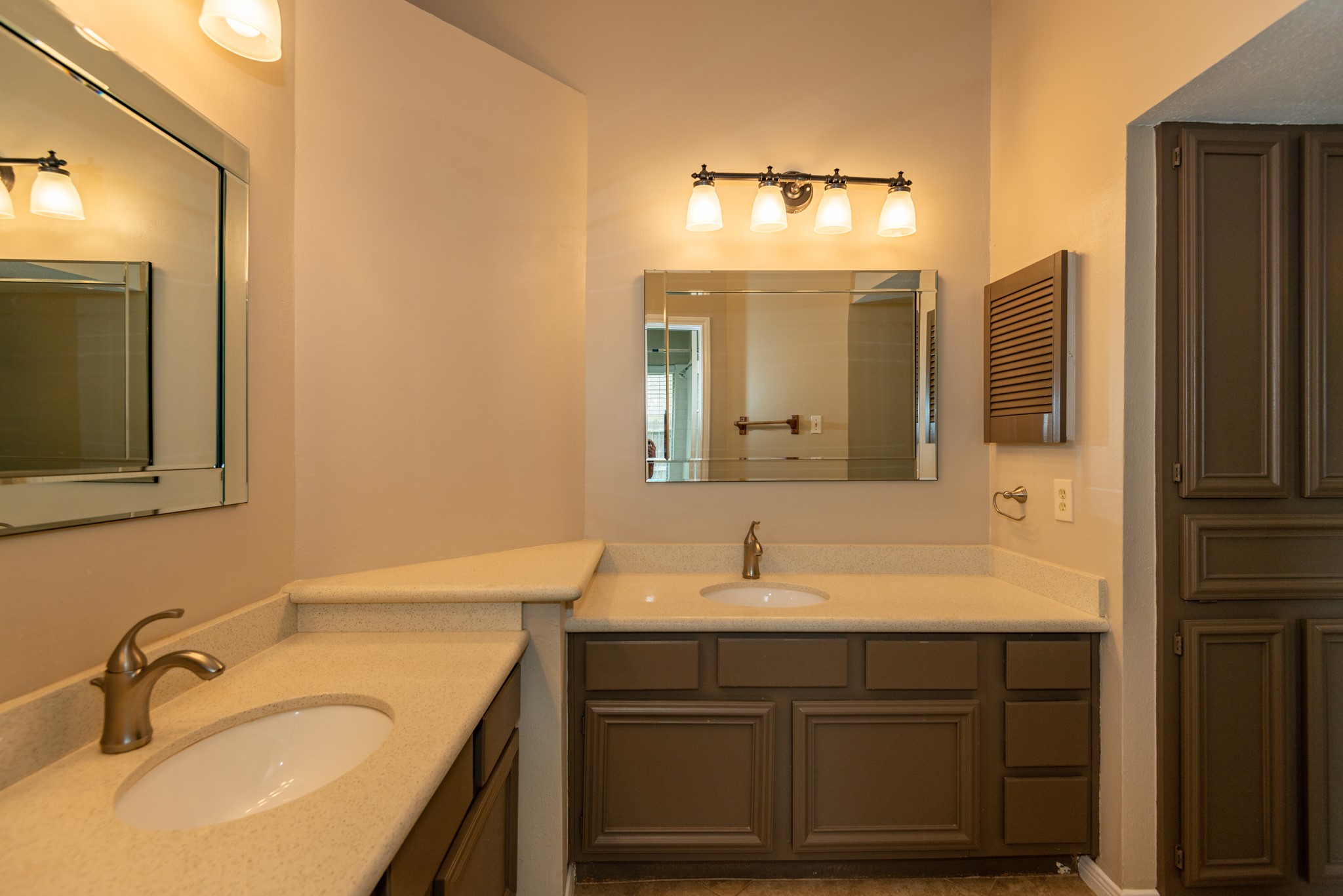 12034 Paddock Way Houston, TX 77065 - Photo 12 of 19 Abundant counter space with double sinks in the primary bathroom.