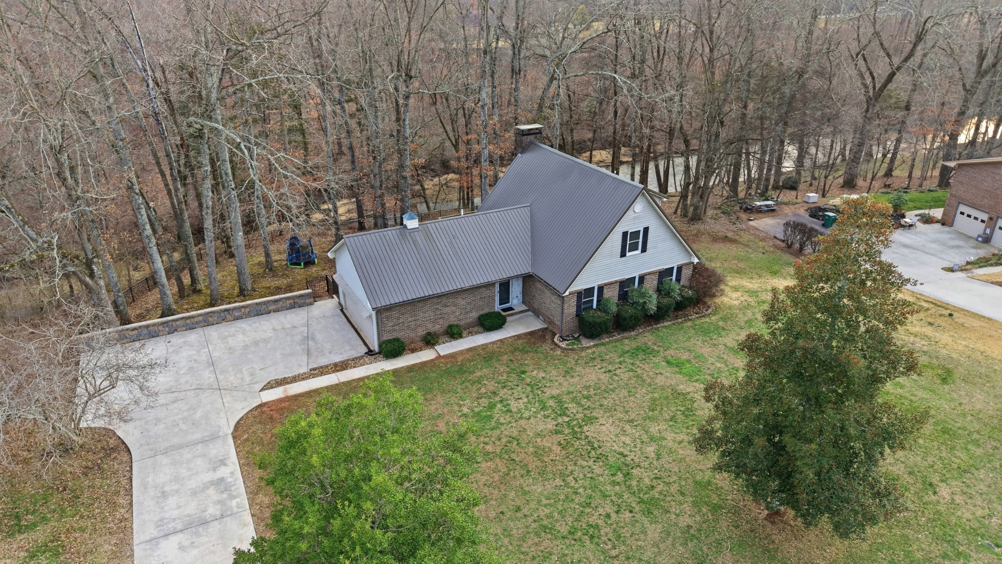 270 Wood Bluff Road Winchester, TN 37398 - Photo 7 of 69 a view of a house with a yard and sitting area