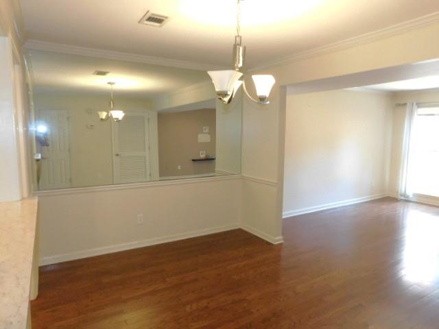 1245 South Ponce De Leon Avenue Northeast, Unit C2 Atlanta, GA 30306 - Photo 11 of 27 a view of a chandelier in a room with a window