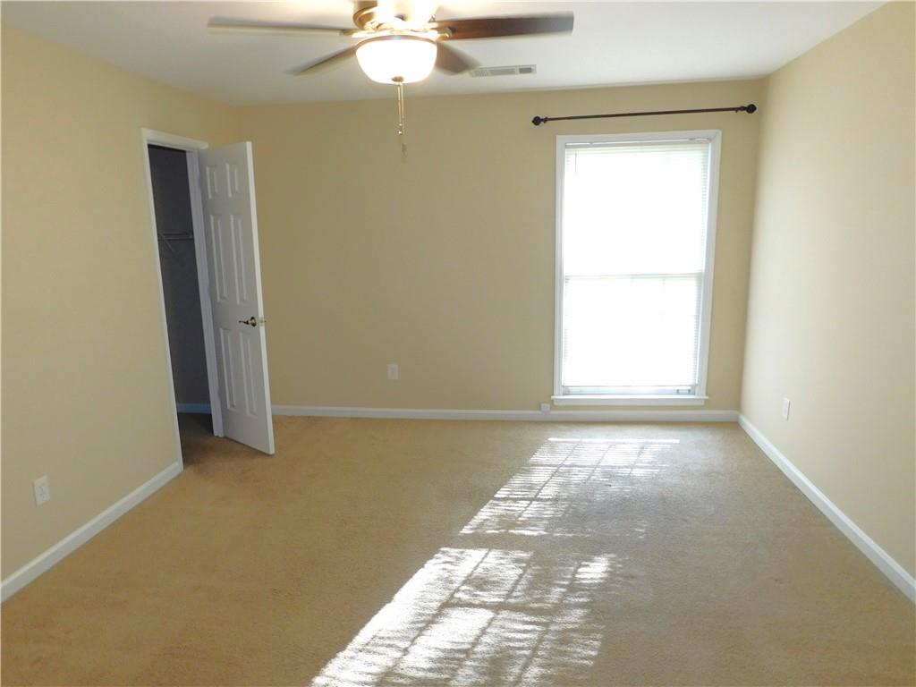 1245 South Ponce De Leon Avenue Northeast, Unit C2 Atlanta, GA 30306 - Photo 19 of 27 an empty room with a window
