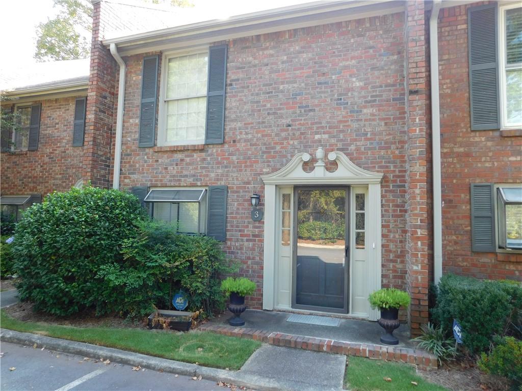 1245 South Ponce De Leon Avenue Northeast, Unit C2 Atlanta, GA 30306 - Photo 2 of 27 a front view of a house with garden