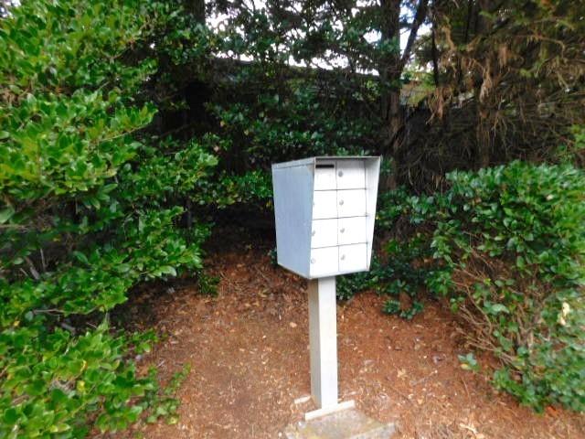 1245 South Ponce De Leon Avenue Northeast, Unit C2 Atlanta, GA 30306 - Photo 24 of 27 a sign board with a tree in the park