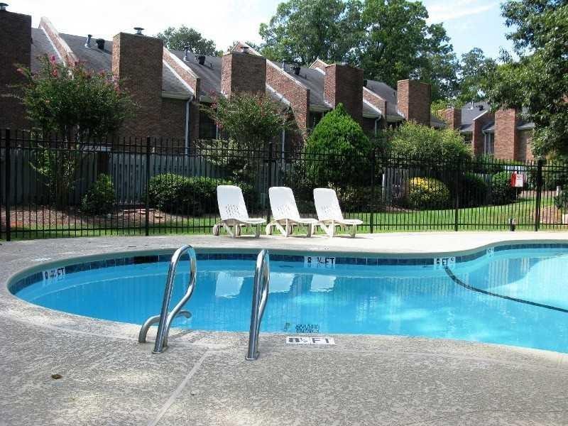 1245 South Ponce De Leon Avenue Northeast, Unit C2 Atlanta, GA 30306 - Photo 25 of 27 a view of a patio with a bench and plants