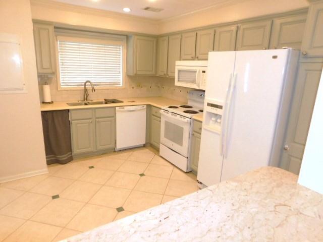1245 South Ponce De Leon Avenue Northeast, Unit C2 Atlanta, GA 30306 - Photo 6 of 27 a kitchen with stainless steel appliances a refrigerator sink and cabinets