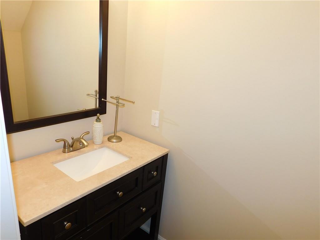 1245 South Ponce De Leon Avenue Northeast, Unit C2 Atlanta, GA 30306 - Photo 10 of 27 a bathroom with a sink and a mirror