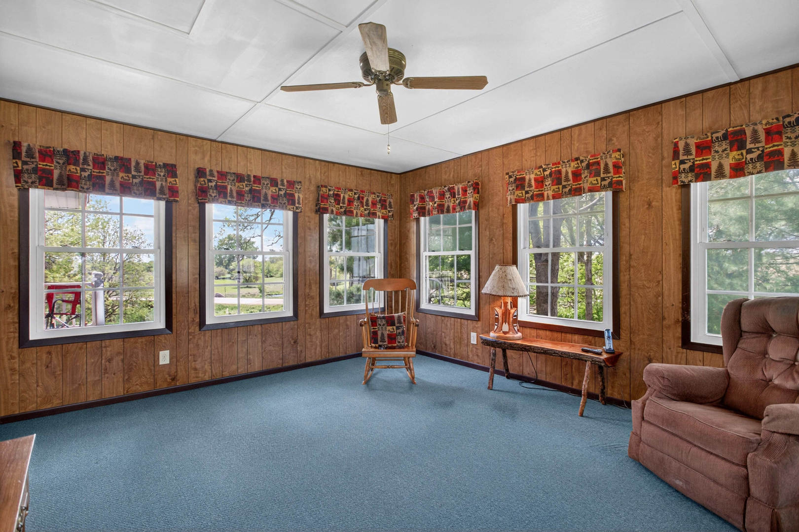 2660 252nd Street De Witt, IA 52742 - Photo 23 of 45 a living room with furniture and a large window