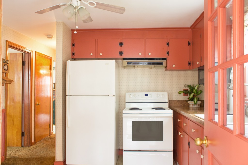 32 Eastside Road Wrentham, MA 02093 - Photo 3 of 20 a kitchen with stainless steel appliances a stove and a refrigerator