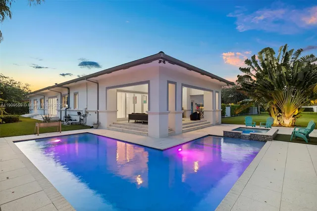 a view of a back yard of the house