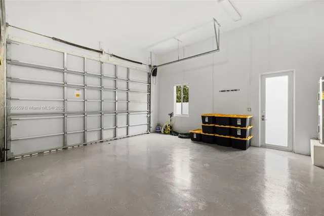 a bathroom with a granite countertop sink a toilet and a mirror