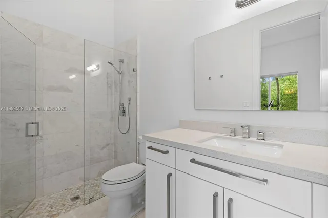 a living room with a couch and a flat screen tv