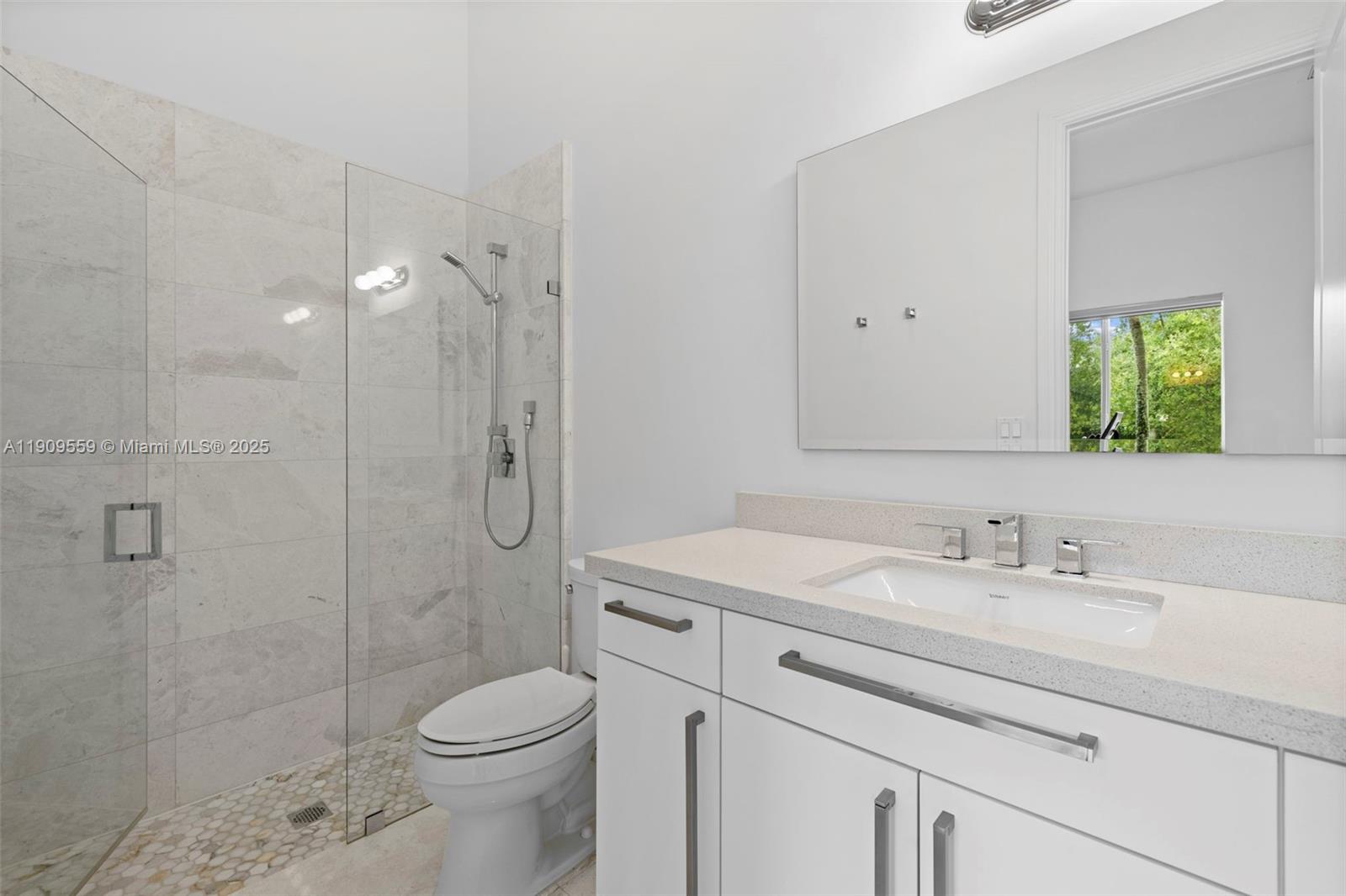 9580 Southwest 101st Terrace Miami, FL 33176 - Photo 35 of 88 a bathroom with a sink toilet and shower