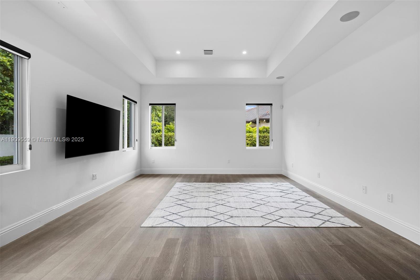 9580 Southwest 101st Terrace Miami, FL 33176 - Photo 45 of 88 wooden floor in an empty room with a window