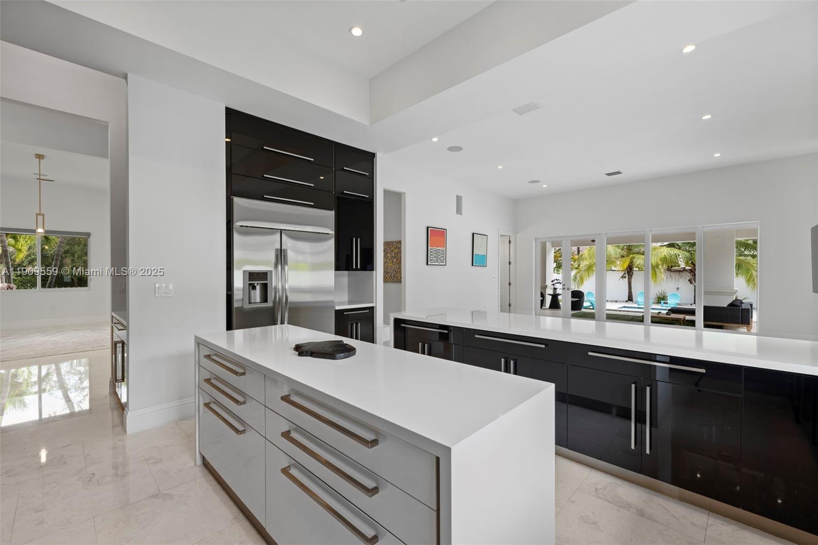 9580 Southwest 101st Terrace Miami, FL 33176 - Photo 64 of 88 a kitchen with a sink stove and cabinets