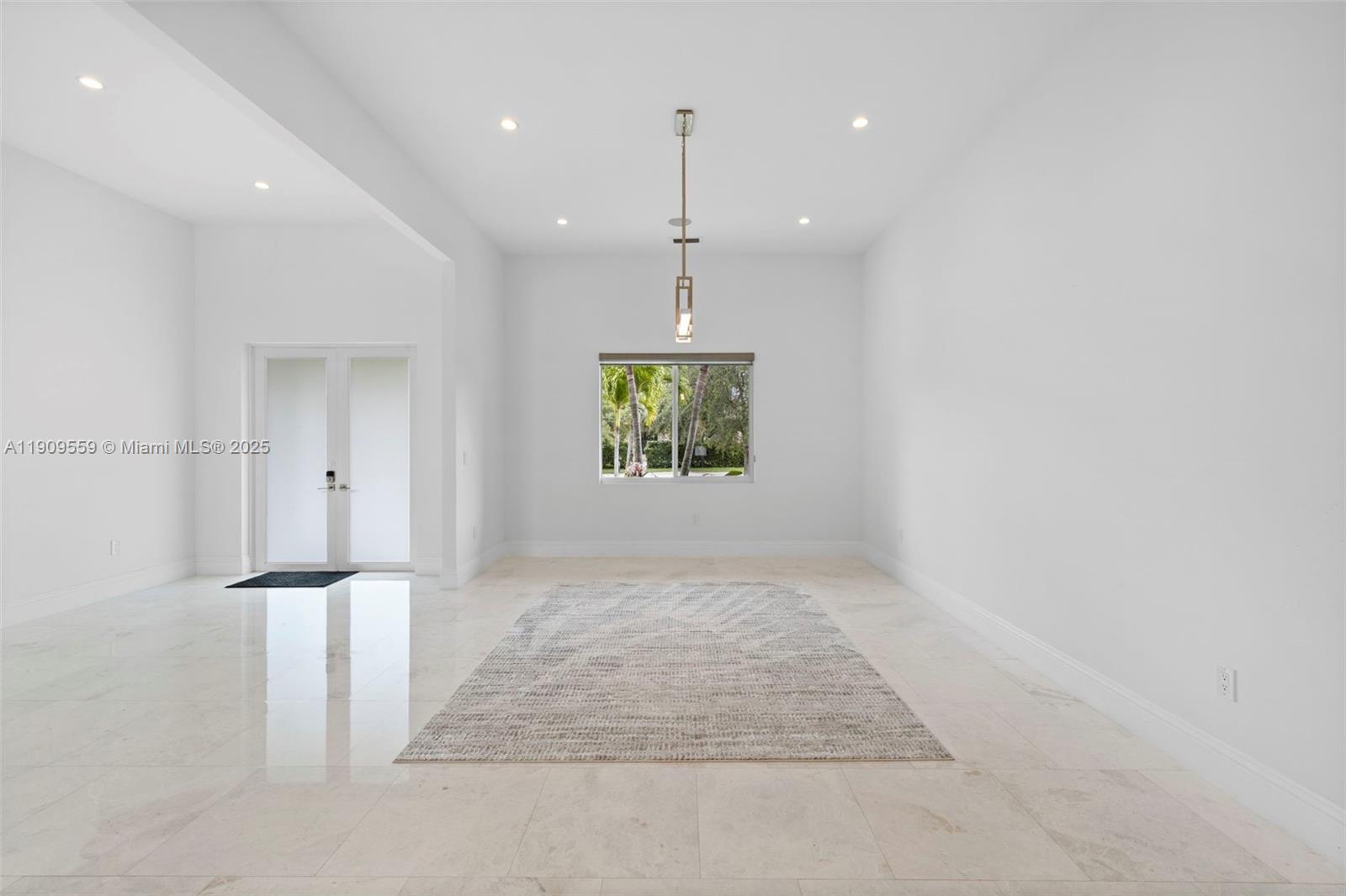 9580 Southwest 101st Terrace Miami, FL 33176 - Photo 77 of 88 an entryway in a hall with a window