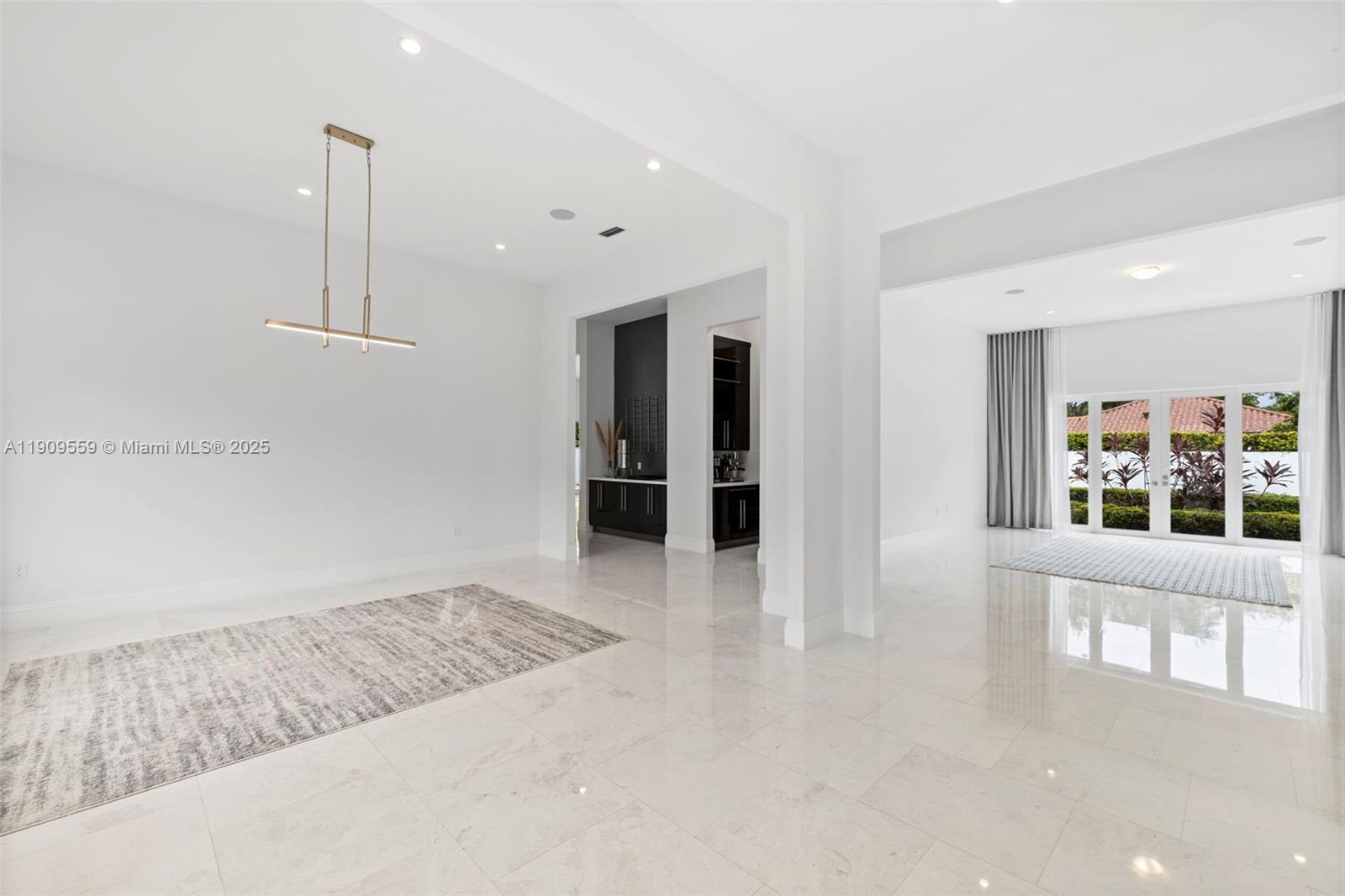 9580 Southwest 101st Terrace Miami, FL 33176 - Photo 79 of 88 wooden floor in an empty room with a window