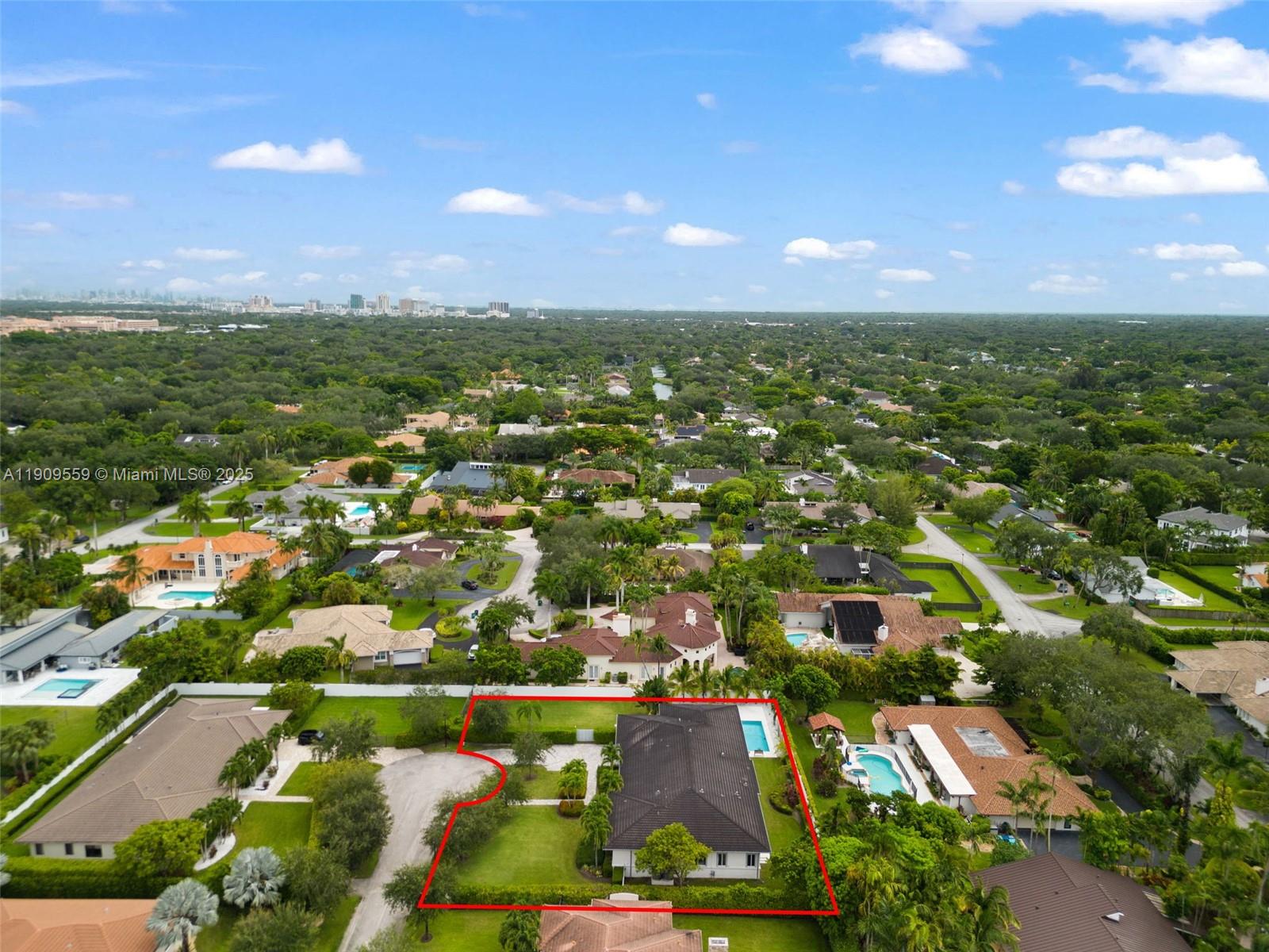 9580 Southwest 101st Terrace Miami, FL 33176 - Photo 86 of 88 an aerial view of residential houses with outdoor space and trees