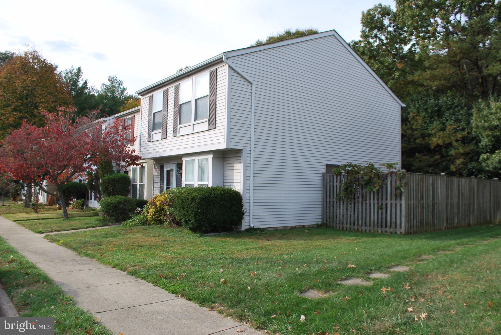 6900 Villa-Del-Rey Court Springfield, VA 22150 - Photo 21 of 29 a front view of a house with a garden