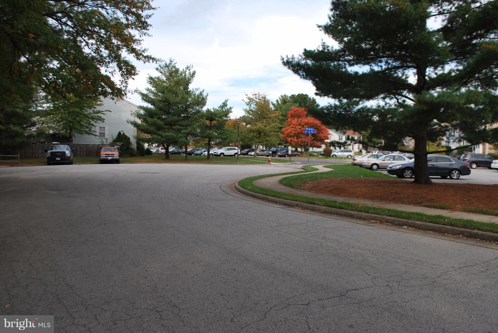 6900 Villa-Del-Rey Court Springfield, VA 22150 - Photo 29 of 29 a view of a street with houses on both side of the road