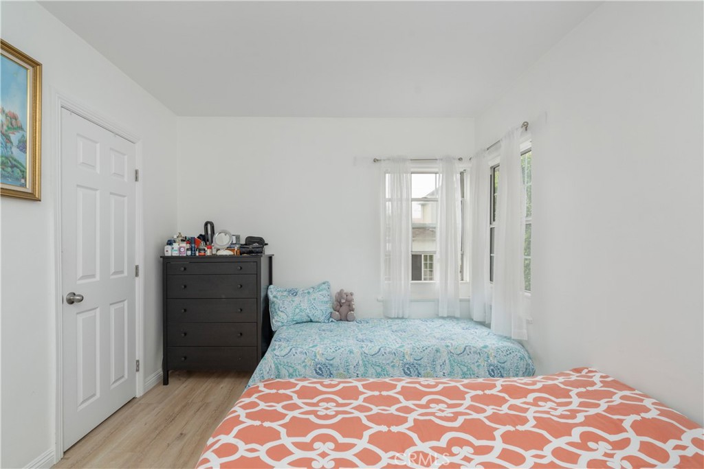 1020 Allen Avenue Glendale, CA 91201 - Photo 5 of 16 a bedroom with a bed and a dresser