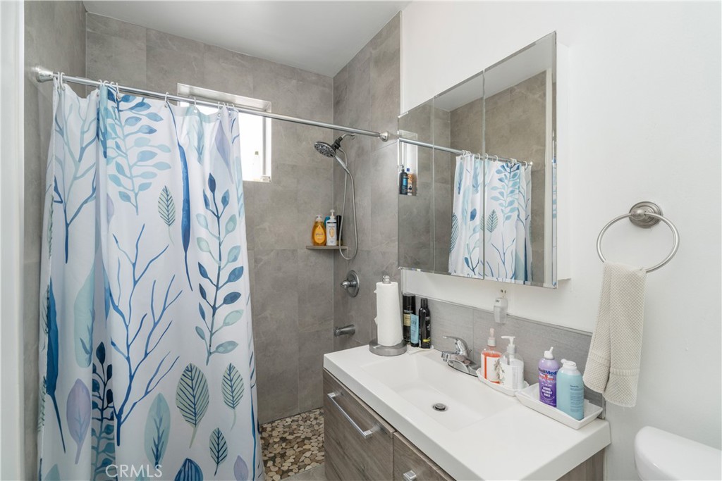 1020 Allen Avenue Glendale, CA 91201 - Photo 6 of 16 a bathroom with a sink and a mirror