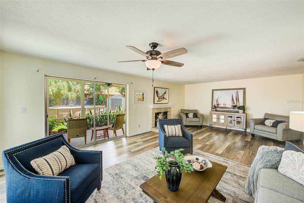 14079 Victoria Road Largo, FL 33774 - Photo 4 of 46 a living room with furniture and a large window