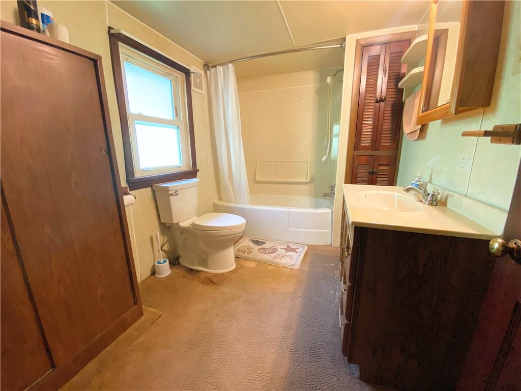 190 Whitestown Road Lyndora, PA 16045 - Photo 8 of 10 a bathroom with a sink and a mirror