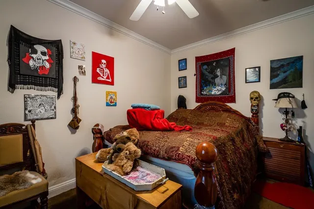 a bedroom with a bed and furniture