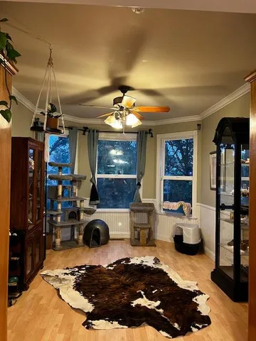 a kitchen with stove and refrigerator