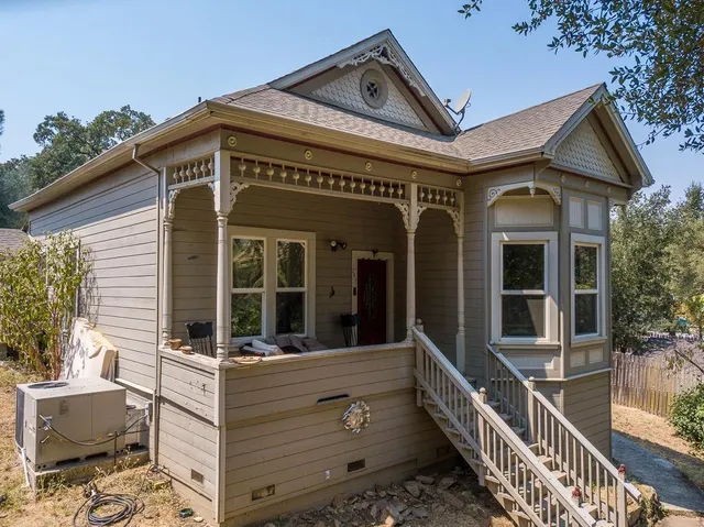 front view of a house with a small porch