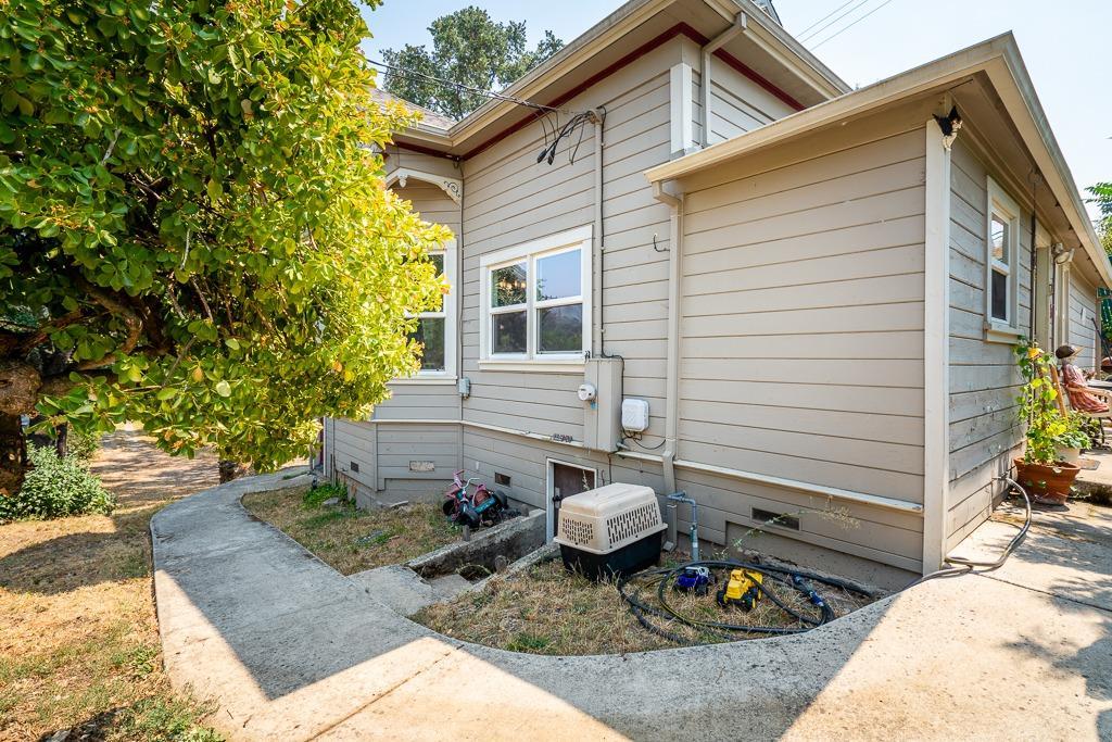 745 North Main Street Jackson, CA 95642 - Photo 6 of 25 a view of a patio with table and chairs and potted plants