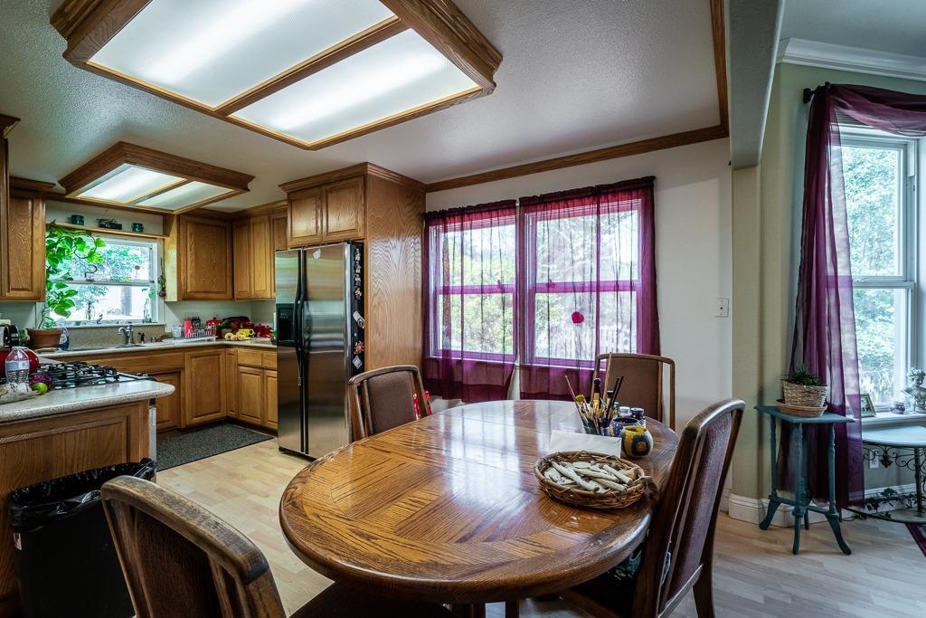 745 North Main Street Jackson, CA 95642 - Photo 10 of 25 a view of a dining room with furniture window and outside view
