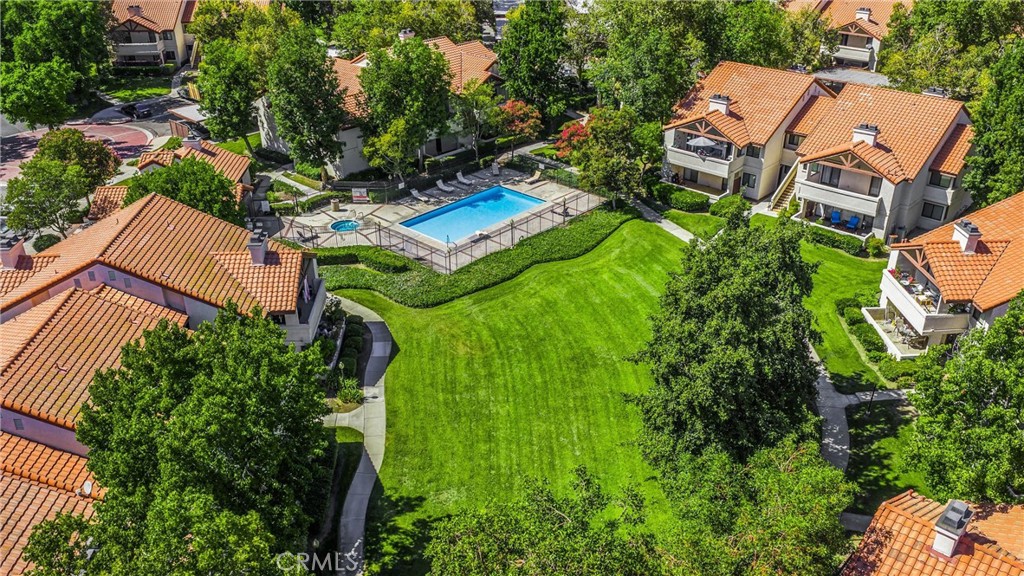 8333 Vineyard Avenue, Unit 4 Rancho Cucamonga, CA 91730 - Photo 20 of 22 an aerial view of a house with a garden