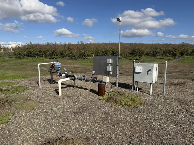 a view of a lake with outdoor seating