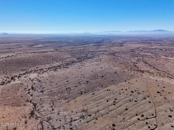 a view of a open area with a yard